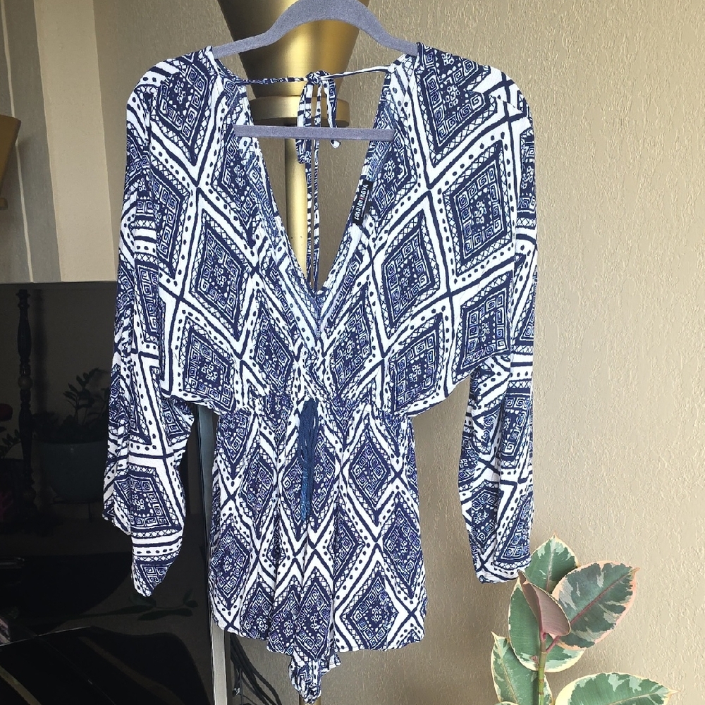 Fashion Nova Blue and White Printed Long Sleeve Romper with Tie Back